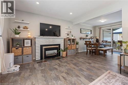 16 Gibson Drive, Simcoe, ON - Indoor Photo Showing Living Room With Fireplace