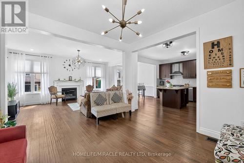 452 Tyrone Crescent, Milton, ON - Indoor Photo Showing Living Room With Fireplace