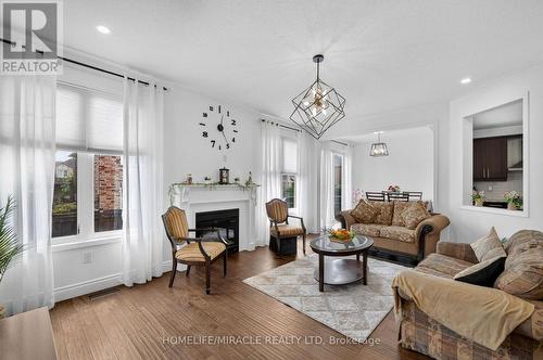 452 Tyrone Crescent, Milton, ON - Indoor Photo Showing Living Room With Fireplace