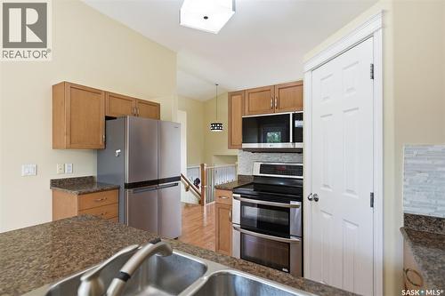 110 Bennion Crescent, Saskatoon, SK - Indoor Photo Showing Kitchen With Stainless Steel Kitchen With Double Sink