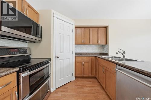 110 Bennion Crescent, Saskatoon, SK - Indoor Photo Showing Kitchen With Stainless Steel Kitchen With Double Sink