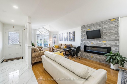 3 Vineberg Drive, Hamilton, ON - Indoor Photo Showing Living Room With Fireplace