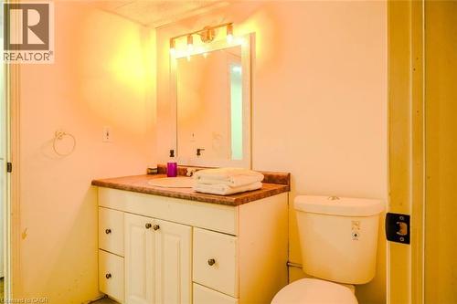 Vanity with a built-in sink, countertop, and storage cabinetry - 107 6Th Line Line, Haldimand, ON - Indoor Photo Showing Bathroom
