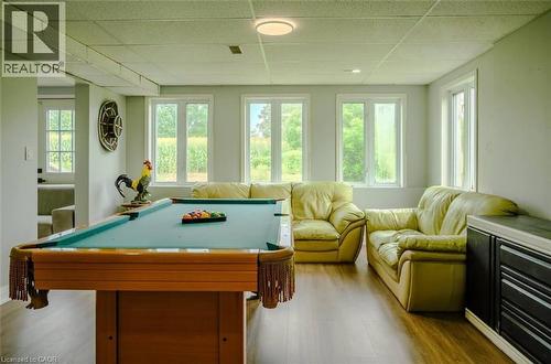 Recessed lighting, wood-finish flooring, and multiple windows - 107 6Th Line Line, Haldimand, ON - Indoor Photo Showing Other Room