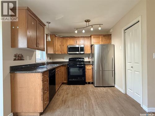 212 415 Lynd Crescent, Saskatoon, SK - Indoor Photo Showing Kitchen With Double Sink