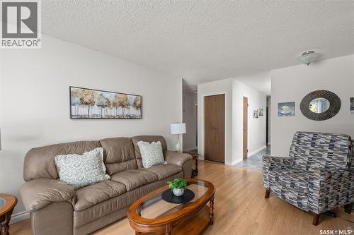 21 Plaxton Place, Prince Albert, SK - Indoor Photo Showing Living Room