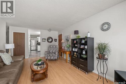21 Plaxton Place, Prince Albert, SK - Indoor Photo Showing Living Room