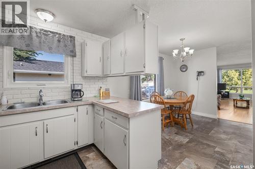 21 Plaxton Place, Prince Albert, SK - Indoor Photo Showing Kitchen With Double Sink