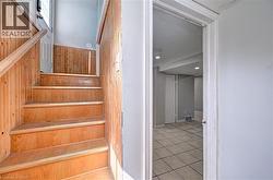 Wood-panel staircase with matching handrail - 
