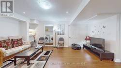 Basement living room showing laundry - 