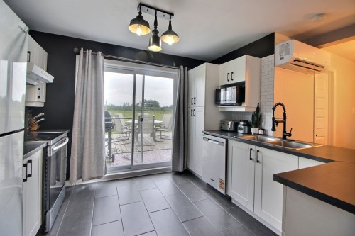 Kitchen - 213 Route 109, Saint-Mathieu-D'Harricana, QC - Indoor Photo Showing Kitchen With Double Sink