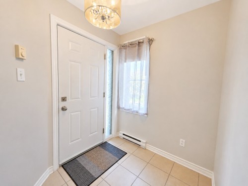 Mud Room - 2-5690 Rue Chevalier, Brossard, QC - Indoor Photo Showing Other Room