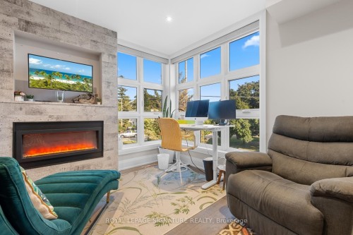 8 Dunkirk Road, Toronto, ON - Indoor Photo Showing Living Room With Fireplace