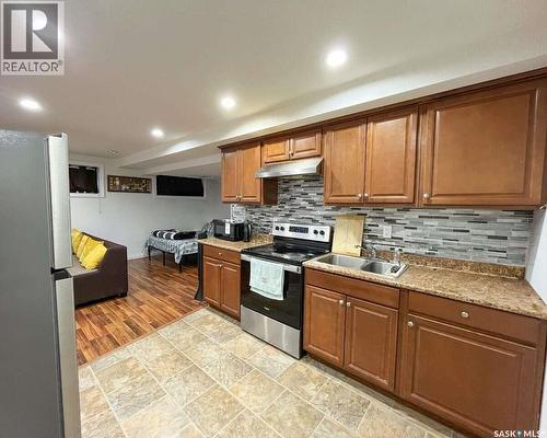 5280 Aerial Crescent, Regina, SK - Indoor Photo Showing Kitchen With Double Sink