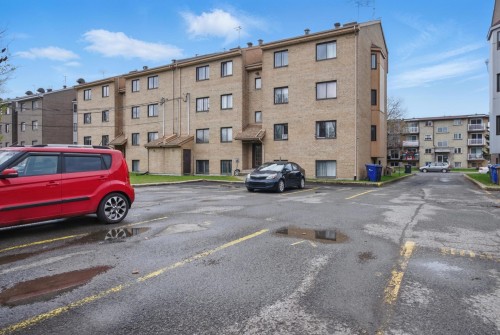 Stationnement - 4-1855 Rue Jean-Picard, Laval (Chomedey), QC - Outdoor