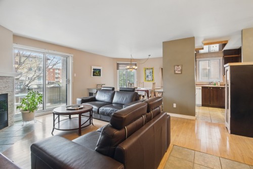 Salon - 4-1855 Rue Jean-Picard, Laval (Chomedey), QC - Indoor Photo Showing Living Room With Fireplace