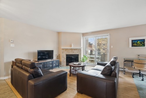 Salon - 4-1855 Rue Jean-Picard, Laval (Chomedey), QC - Indoor Photo Showing Living Room With Fireplace