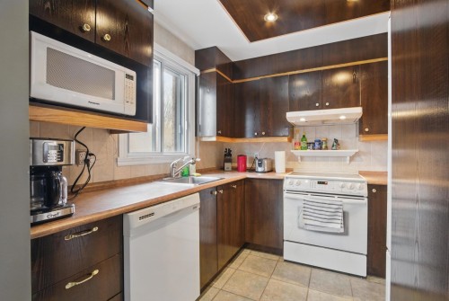 Cuisine - 4-1855 Rue Jean-Picard, Laval (Chomedey), QC - Indoor Photo Showing Kitchen
