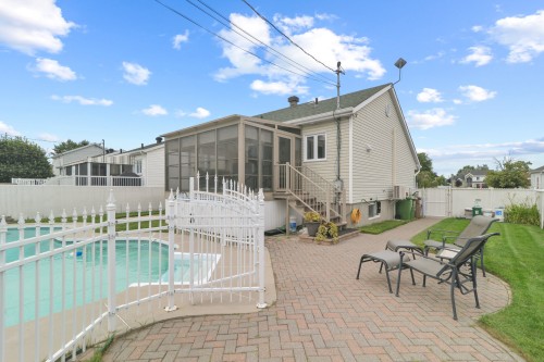 Courtyard - 108 Rue Vanier, Saint-Constant, QC 