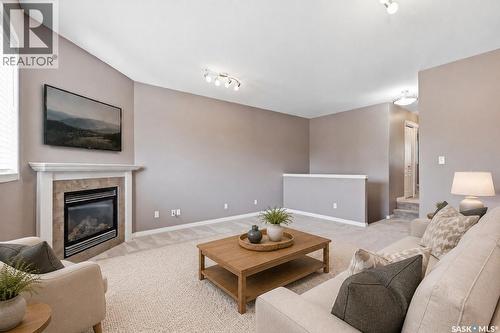7 110 Dulmage Crescent, Saskatoon, SK - Indoor Photo Showing Living Room With Fireplace