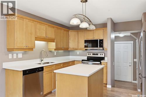 7 110 Dulmage Crescent, Saskatoon, SK - Indoor Photo Showing Kitchen With Stainless Steel Kitchen With Double Sink