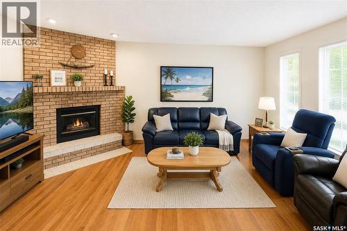 2906 Huget Place, Regina, SK - Indoor Photo Showing Living Room With Fireplace