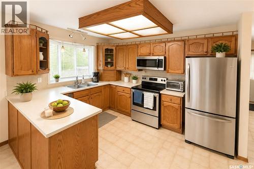 2906 Huget Place, Regina, SK - Indoor Photo Showing Kitchen With Double Sink
