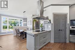 Walk-in pantry at right. - 