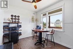 Den/Meeting/Work Space with wet bar on main floor. - 