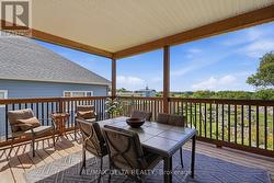 Dine on the deck with mountain view. - 