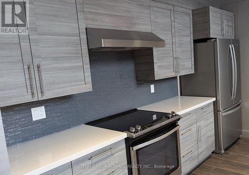 809 - 2093 Fairview Street, Burlington, ON - Indoor Photo Showing Kitchen With Upgraded Kitchen