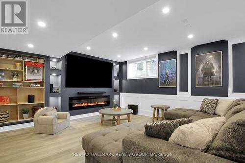 Finished lower level - 636 Eagle Crest Heights, Ottawa, ON - Indoor With Fireplace