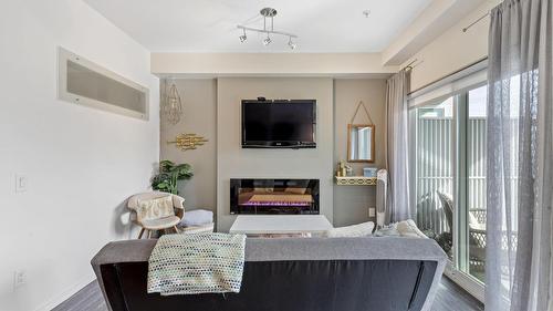 511-1290 St. Paul Street, Kelowna, BC - Indoor Photo Showing Other Room With Fireplace
