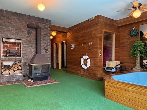 55 Ambassador Row, Winnipeg, MB - Indoor Photo Showing Other Room With Fireplace