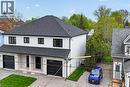Modern multi-unit residence with white siding and a dark shingle roof - 45B Howard Street, Hagersville, ON 