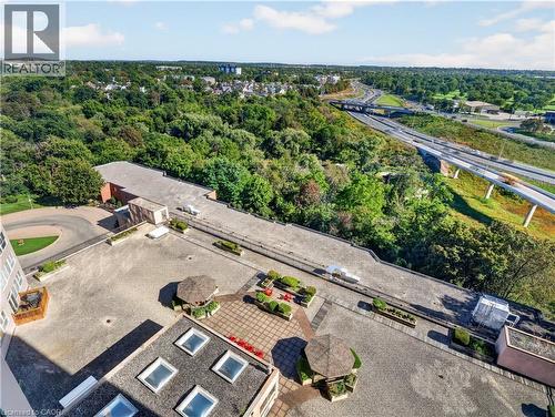 Rooftop terrace with paved surfaces, integrated planters, and a shaded gazebo structure - 7 Gale Crescent Unit# 1107, St. Catharines, ON 
