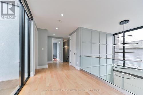 Wide expansive hallways, walls of windows - 96 Squires Avenue, Toronto, ON 