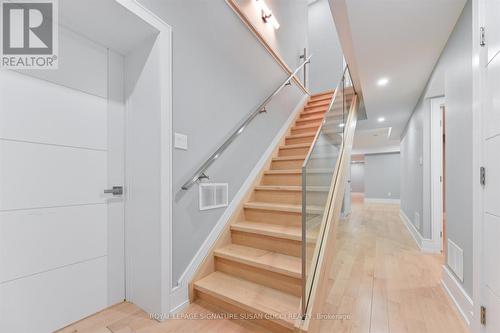 Lower level stairs, wide hallways - 96 Squires Avenue, Toronto, ON 