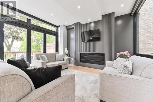Cozy gas fireplace  in family room - 96 Squires Avenue, Toronto, ON 