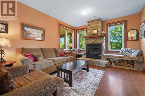 Living Room with Fireplace - 25 Cole Point Trail, Mckellar, ON 