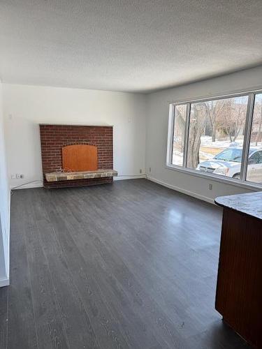 Photos are of main floor 3 bedroom suite prior to tenant moving in - 1013 12Th Street, Brandon, MB 