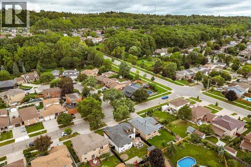Aerial perspective showcasing a residential neighborhood with mature trees - 9 Midway Street, Hamilton, ON 