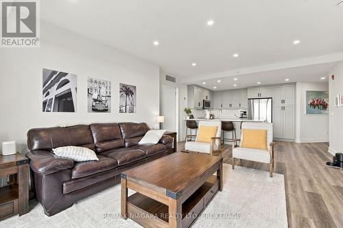 Open-concept kitchen and living space - 509B - 300B Fourth Avenue, St. Catharines (Ridley), ON 