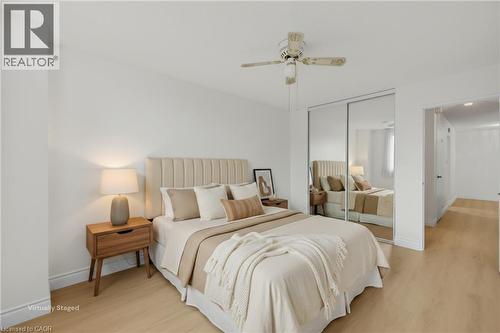 Virtually staged - 975 Warwick Court Unit# 310, Burlington, ON 