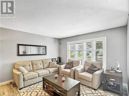 7 ACTON CRESCENT , London South (South Y), Ontario N6E 1W6 3