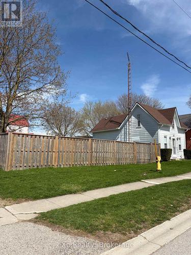 West St: Fence, hydrant, sidewalk - 8 West Street, Perth East (Milverton), ON 