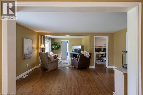 Wood-finish flooring throughout, bright walls, and a window with natural light - 78 Oak Street, Simcoe, ON 