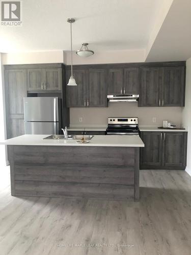 2B - 155 THOMAS SLEE DRIVE , Kitchener, Ontario N2P 0J8 5