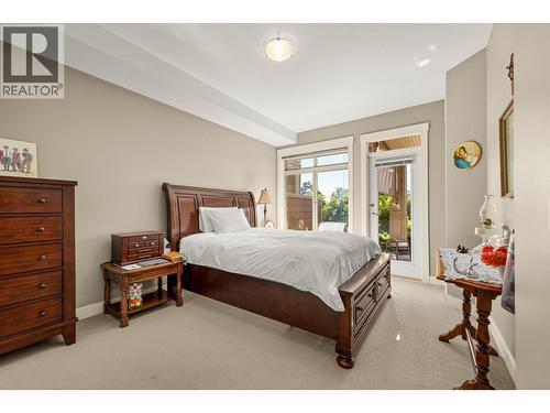 Primary bedroom boasts a walk out to the patio. - 3545 Carrington Road Unit# 108, West Kelowna, BC 