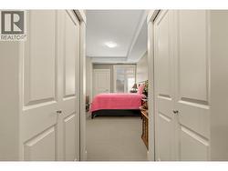 walk through the double closets to the tandem ensuite. - 